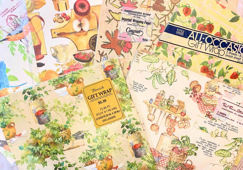 May include: A selection of vintage gift wrap featuring various floral and fruit designs. The wraps are in shades of yellow, green, red, and blue. The text on the wraps reads "Flourish Gift Wrap &pound;1.10 2 Sheets 25 in x 20 in for larger", "All Occasion Gift Wrap 2 Sheets - 8.5 x 11 in (each sheet 17 x 11 in)", and "Red Farm Store Pantucket, RI 02863 2 Sheets Each Sheet 17 x 11 in".
