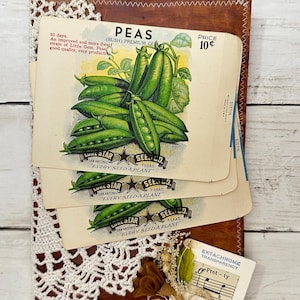 May include: Vintage seed packet for peas with a green and white illustration of peas. The packet reads "Peas, Crush O Premium Grade, Price 10c,  See Star Seed Co., Every Seed A Plant".