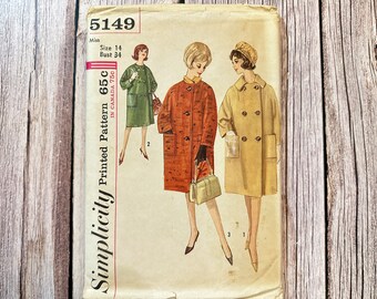May include: Vintage Simplicity pattern 5149 featuring illustrations of women's coats. The pattern includes a green, orange, and tan coat design. The pattern is size 14, bust 34, and priced at 65c in Canada.