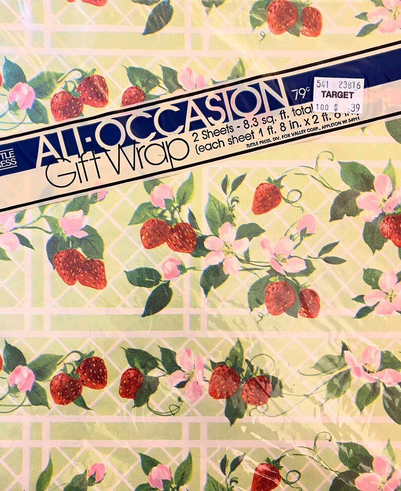 May include: A green and white patterned gift wrap with a strawberry design. The wrap is labelled "All Occasion Gift Wrap" and has a price tag that says "79 pence" and "Target".