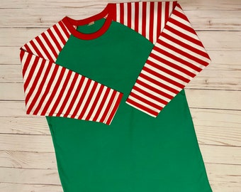 green and white raglan shirt