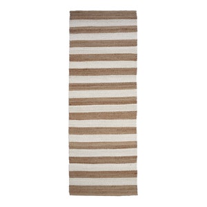 May include: A long, narrow, brown and white striped rug made of natural fibers. The rug has a woven texture and is perfect for adding a touch of natural style to any room.