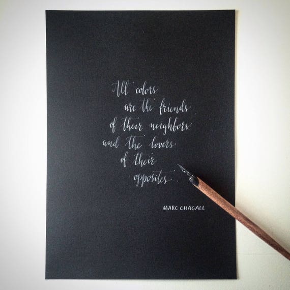 custom modern calligraphy in white ink on black paper for etsy