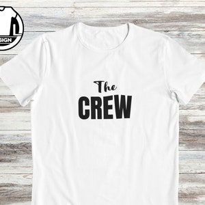 Pode incluir: Camiseta branca com texto preto que diz "The Crew".