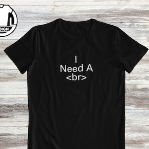 May include: Black t-shirt with white text that reads "I Need A <br>"