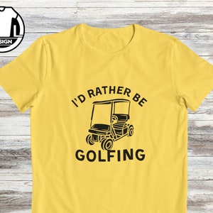 May include: Yellow t-shirt with a black graphic of a golf cart and the text "I'd rather be golfing".