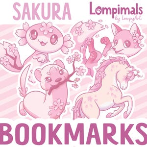 May include: Pink Sakura-themed bookmarks featuring cute animal illustrations. The bookmarks include an axolotl, fox, ferret, and unicorn, all adorned with cherry blossoms. The word "SAKURA" and "BOOKMARKS" are displayed in pink text.