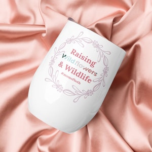 Raising Wildflowers and Wildlife Wine tumbler