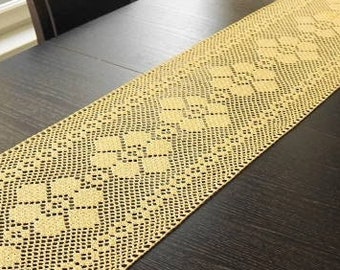 Light yellow crochet table runner