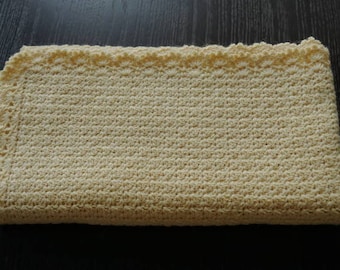 Light yellow crochet baby blanket