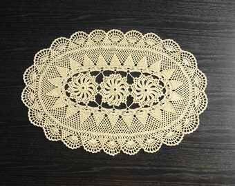 Yellowish beige oval crochet cotton doily - vintage