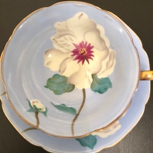 Vintage Cup and Saucer made in Occupied Japan Blue with Beautiful White Flower