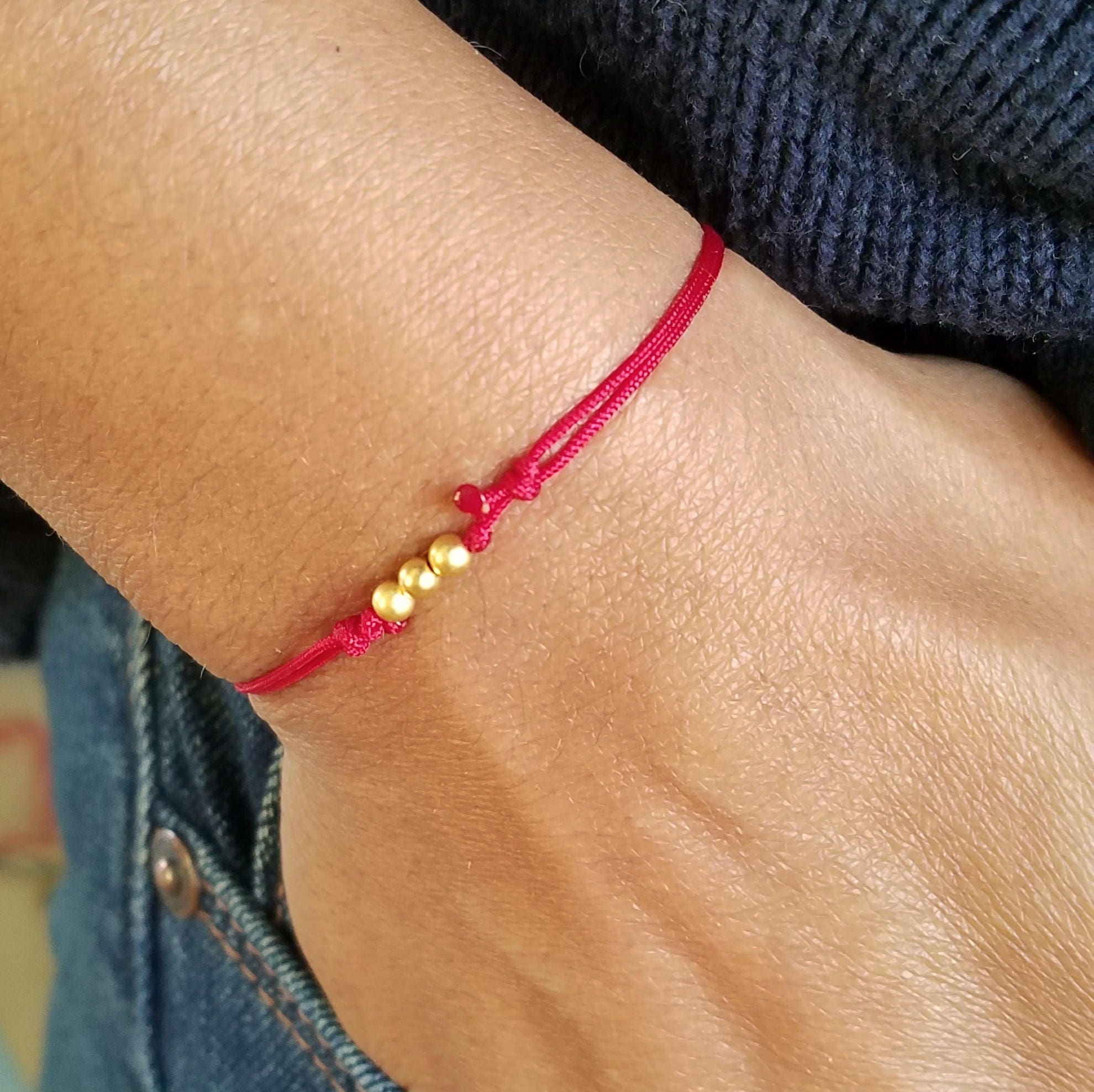 Buy Yashvin Brand Hand Made KALAVA with SWASTIK Set of 2 | Swastik Band  Fashion Beaded Red Bracelet for Girls/Boys Synthetic Plastic Beads at  Amazon.in