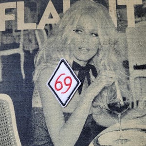 Raro distintivo ricamato 69