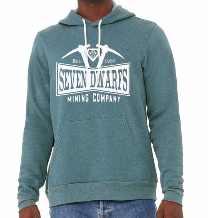 May include: A teal blue hooded sweatshirt with a white graphic print of a diamond, two pickaxes, and the text "Est. 1937 Seven Dwarfs Mining Company".