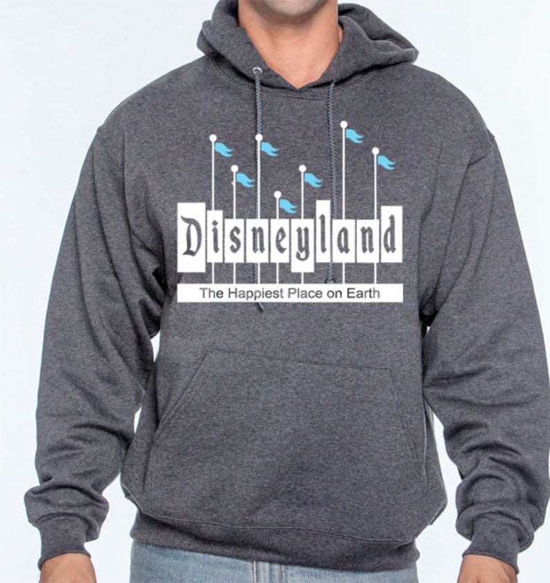 May include: A dark grey hooded sweatshirt with a white graphic of the Disneyland logo and the text "The Happiest Place on Earth".