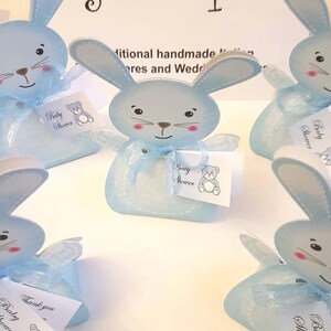 Niedliche Babyparty Gastgeschenke: Kundenspezifische Häschen-Gastgeschenke