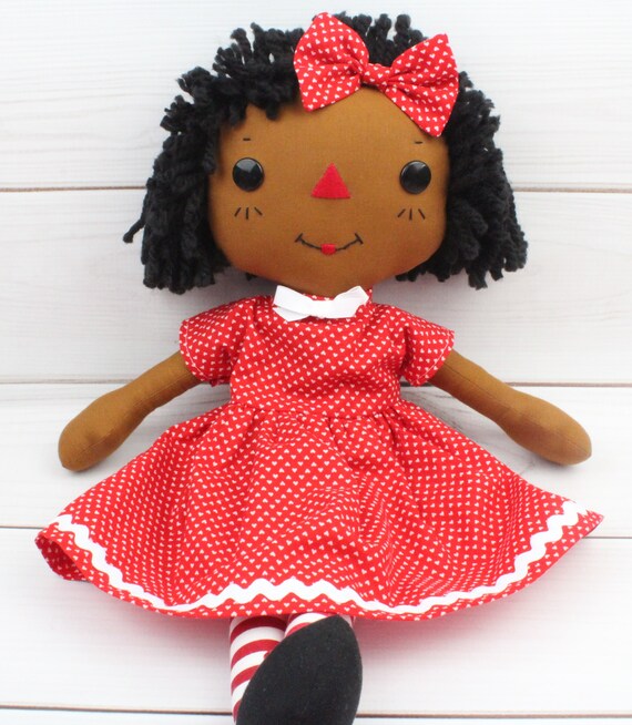 black raggedy ann doll with red hair