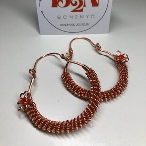 Wire wrapped earrings. Copper earrings with fine crystal flower. Wrapped swirl earrings. Coiled wire earrings. Boho, handmade earrings.