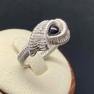 Silver wrapped ring with black tourmaline. Sterling silver or Argentium silver. Solitaire black tourmaline ball. Coiled wire ring. Handmade.