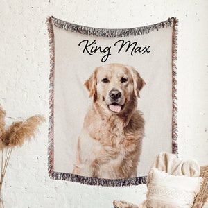 May include: A woven tapestry wall hanging with a golden retriever dog and the text "King Max" printed on it.