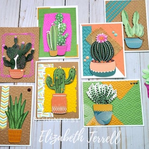 May include: A collection of seven handmade cards featuring different types of cacti and succulents in colorful pots. The cards are decorated with various patterned papers and embellishments. The cards are designed by Elizabeth Terrell.