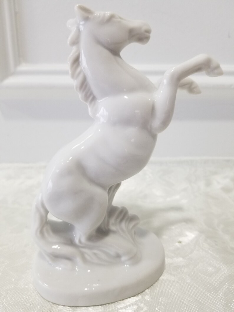 white porcelain horse statue