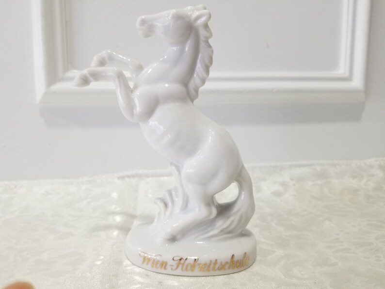 white porcelain horse statue