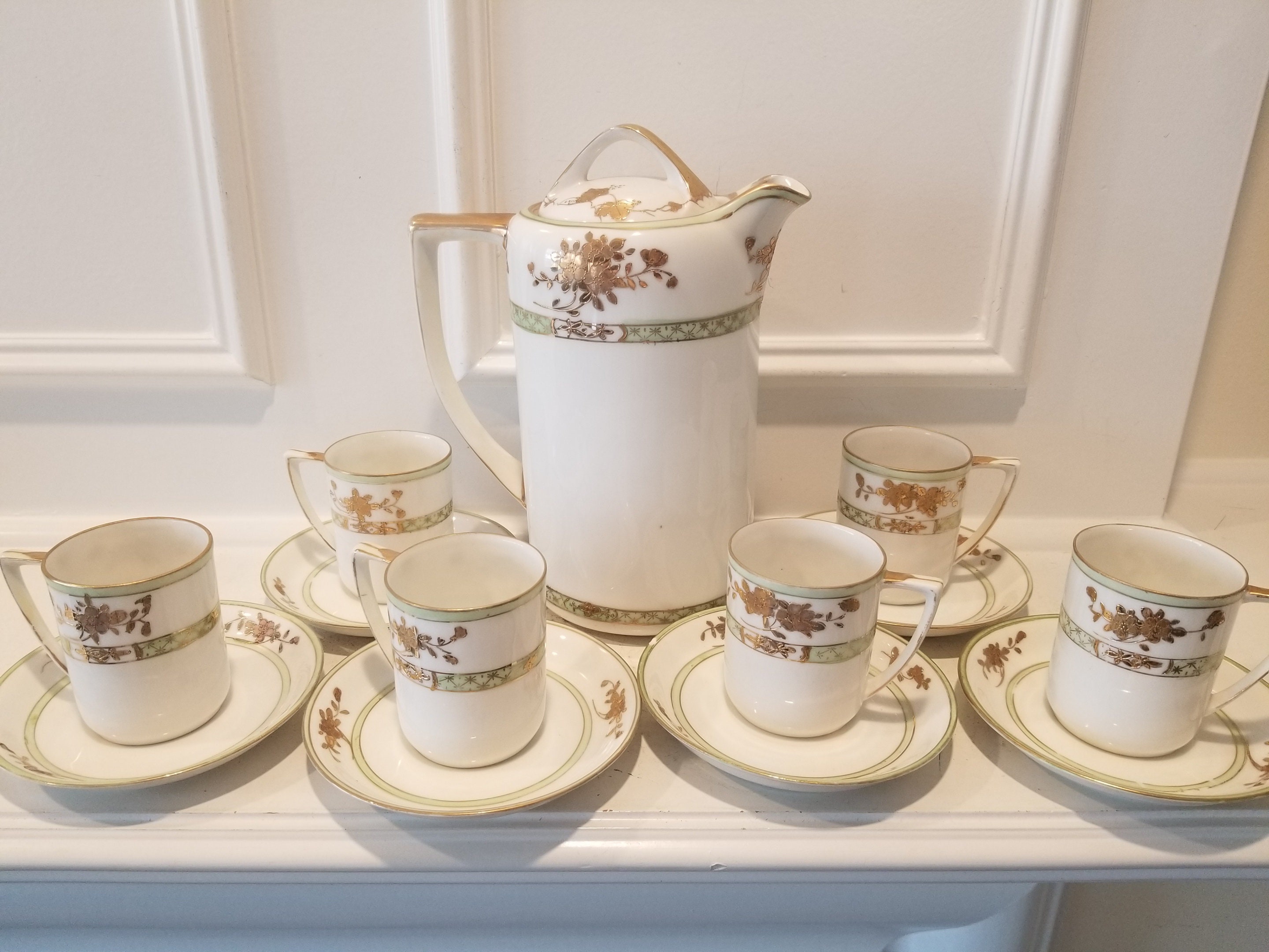 Antique Nippon Set Coffee/Teapot With 6 Cups Flower pattern.