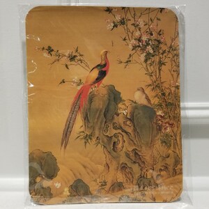 May include: A vintage-style print of two birds perched on a rock. The larger bird is a pheasant with a red, yellow, and black plumage. The smaller bird is white with a brown head. The birds are surrounded by a flowering tree with pink blossoms. The print is on a gold background with a Chinese inscription at the bottom.