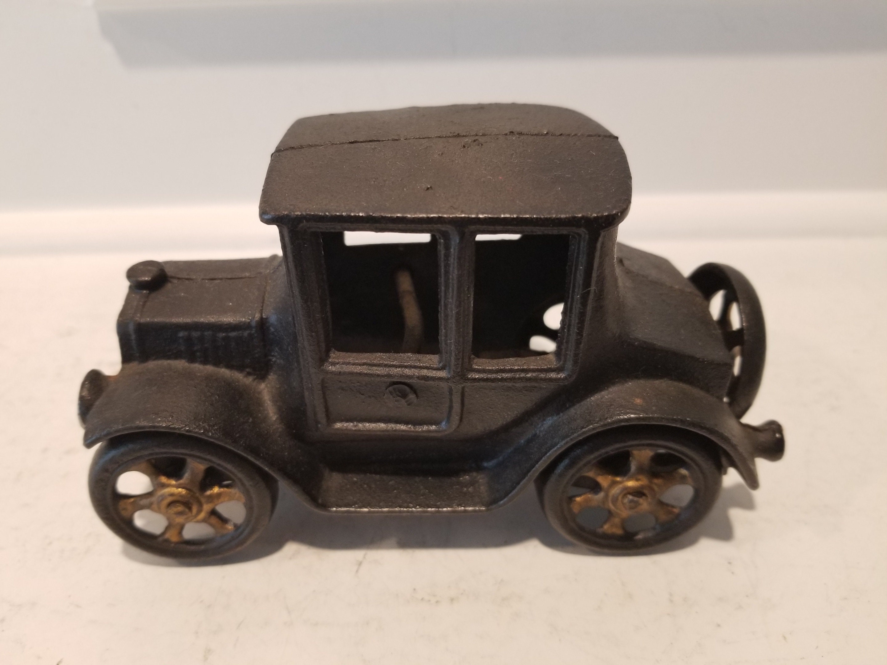 old cast iron toy cars