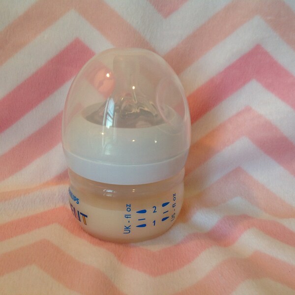 Adorable! 2oz. Reborn bottle with fake formula.