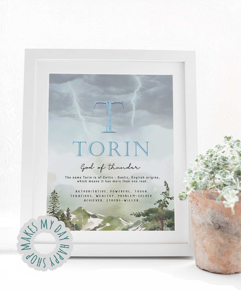 May include: Framed art print featuring the name "Torin" with a watercolor landscape and lightning background. The text describes the name's origins and associated traits: authoritative, powerful, tough, tenacious, wealthy, problem-solver, and strong-willed.