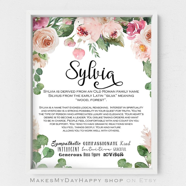 May include: A printable digital download with a floral design and the name Sylvia in a decorative font. The text explains the meaning of the name Sylvia and lists personality traits associated with the name, such as sympathetic, compassionate, kind, intelligent, intuitive, graceful, generous, boss figure, and advisor.