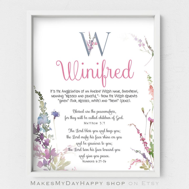 May include: A watercolor print with a floral design and the name Winifred in pink lettering. The print also includes a large letter W in gray and a quote about peacemakers from the Bible.