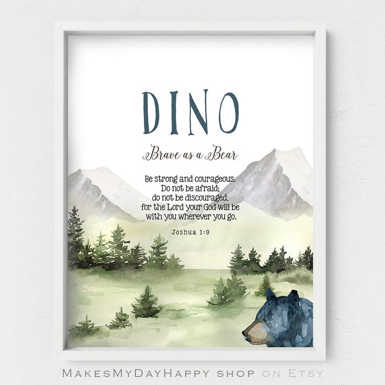 May include: A watercolor print with a mountain landscape and a black bear. The print features the name "DINO" and the text "Brave as a Bear". The text "Be strong and courageous. Do not be afraid; do not be discouraged, for the Lord your God will be with you wherever you go. Joshua 1:9" is also included.