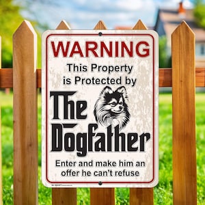 May include: A white and red warning sign with a black and white image of a Pomeranian dog. The sign reads "WARNING This Property is Protected by The Dogfather Enter and make him an offer he can't refuse".