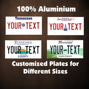 May include: Four rectangular 100% aluminium license plates with customizable text. Designs include Tennessee state themes with graphics like the state flag, a capitol building, a sunrise, and mountain landscapes. Text reads 100% Aluminium and Customized Plates for Different Sizes.