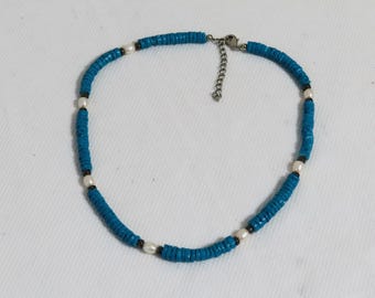 Blue puka shell freshwater pearl and hematite beaded choker necklace