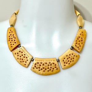 Antique hand carved floral bone necklace.