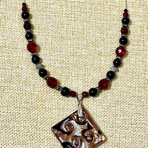 Glass red and black necklace with lampwork glass pendant