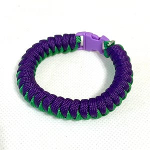 Handmade purple and green corkscrew paracord bracelet