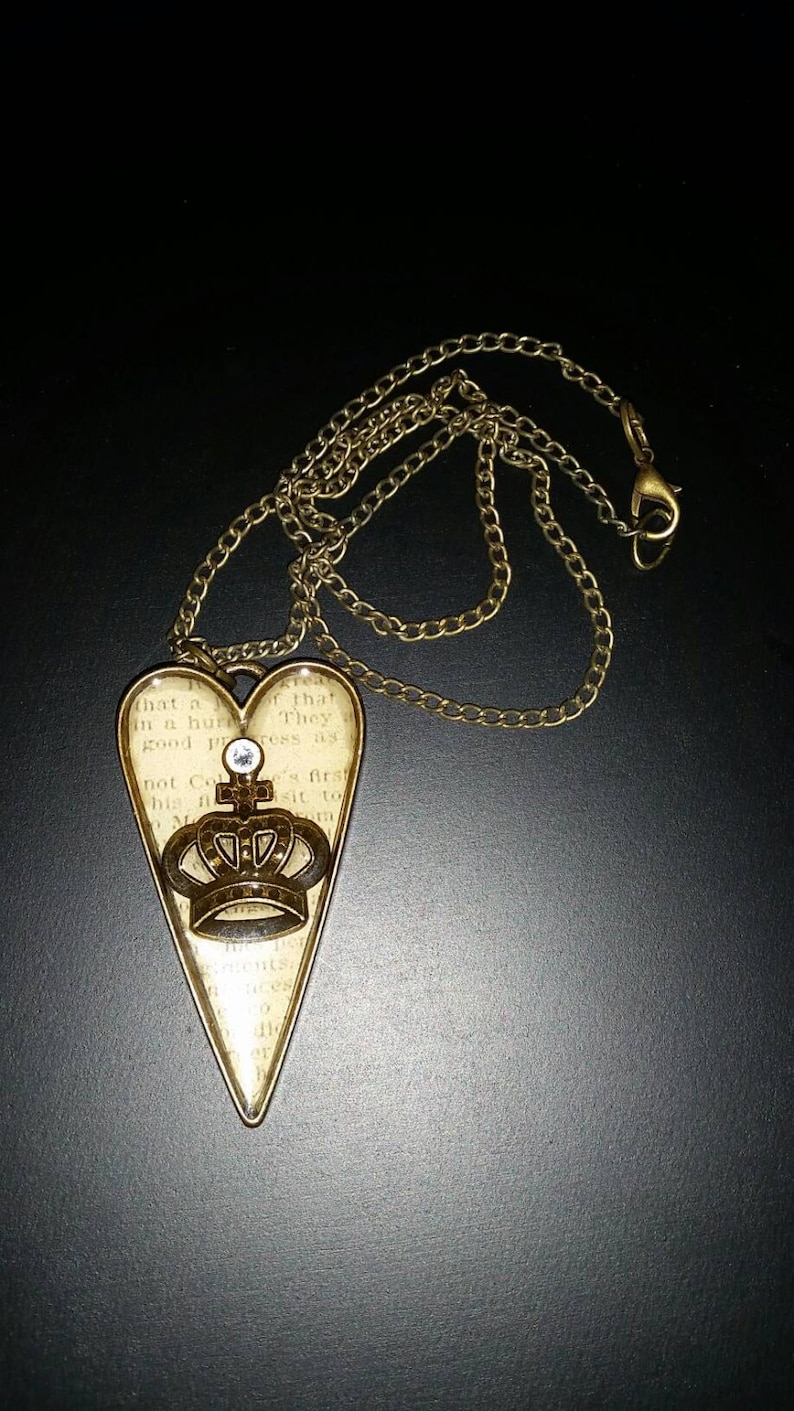 Queen of hearts brass pendant necklace set in resin. Etsy