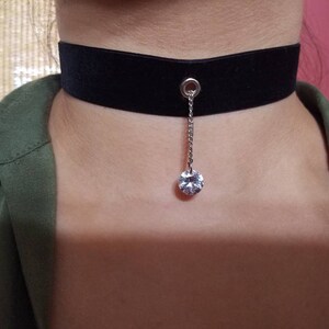 Edgy Glam Choker. Black grommet and rhinestone accent choker. Lovely for holidays or dress up a casual outfit. Rockstar jewelry.