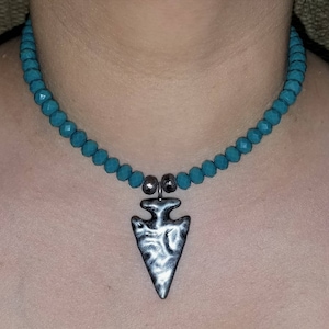 Turquoise Crystal necklace with gunmetal druzy accent beads and gunmetal hammered arrowhead center piece. Boho Chic necklace.