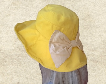 Sombrero cloche de algodón para el sol: ala de verano, detalle de lazo