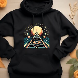 Cosmic Hoodie. Cosmic Gift. Geometric Hoodie. Geometric Gift. Eye Pyramid Hoodie. Eye Pyramid Gift. Sunburst Sweatshirt. Sunburst Hoodie
