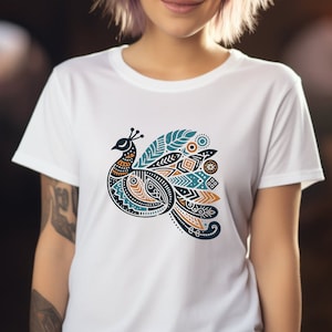 May include: White t-shirt with a graphic print of a peacock with blue, orange, and black geometric patterns.