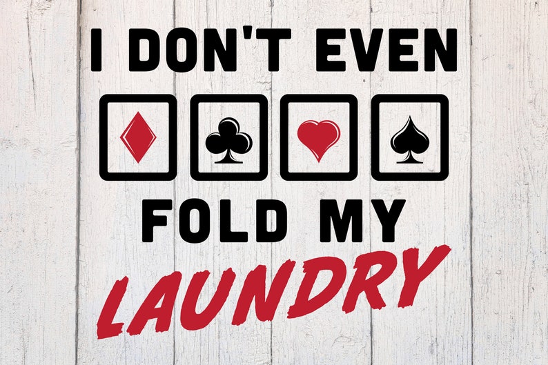 May include: A white wood background with black text that reads "I don't even fold my laundry" with four black squares with red playing card suits inside. The word "laundry" is in red.