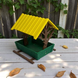 Backyard Bird Feeder with Yellow Roof, Rustic Tree Branch Design